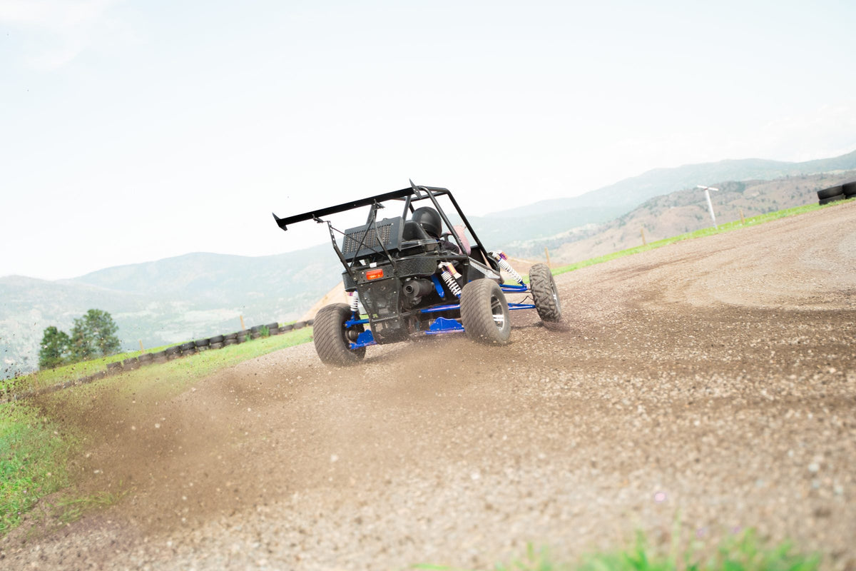 Rally Kart throwing gravel on the Area 27 loose-surface course near Oliver BC