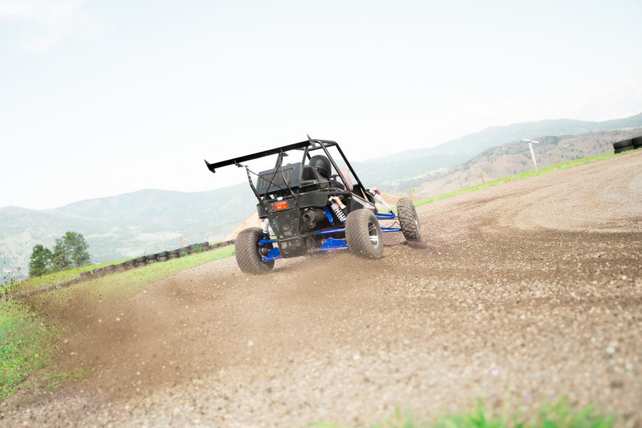 Rally Kart throwing gravel on the Area 27 loose-surface course near Oliver BC