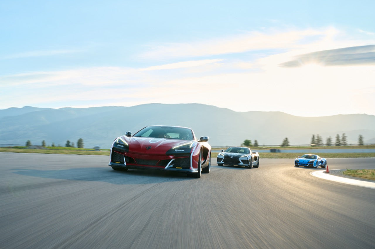 Three sports cars driving the Area 27 circuit in the Okanagan
